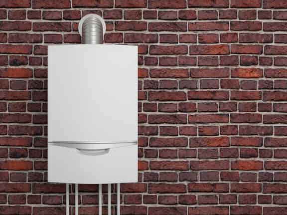 This is a photo of a gas combi boiler installed on a brick wall maybe in Sunderland