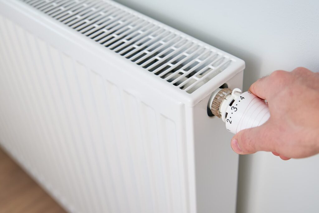 This is a photo of a dining room radiator with a trv installed maybe in Sunderland